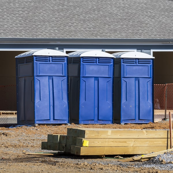 how often are the portable restrooms cleaned and serviced during a rental period in Clarendon